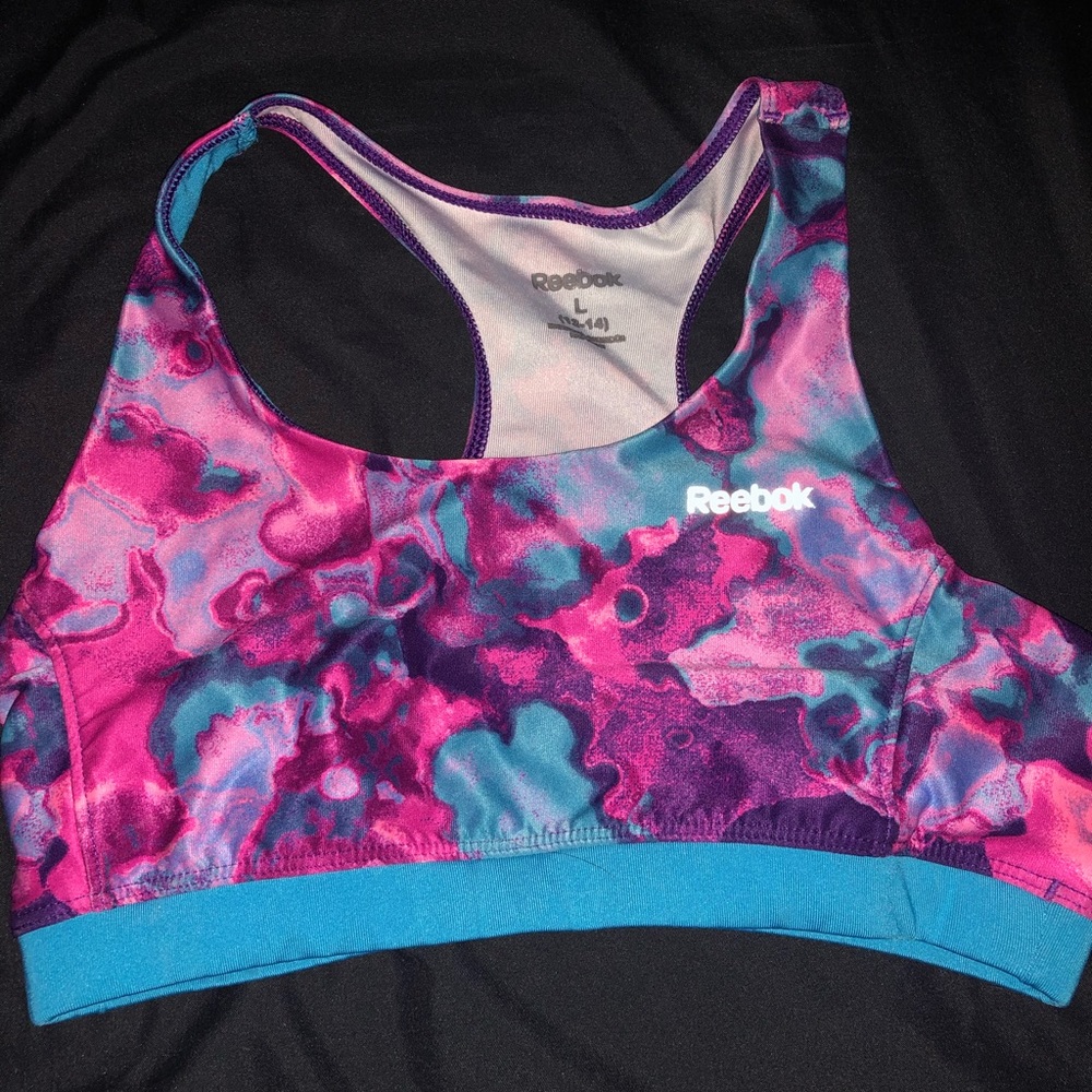 multi colored reebok sports bra